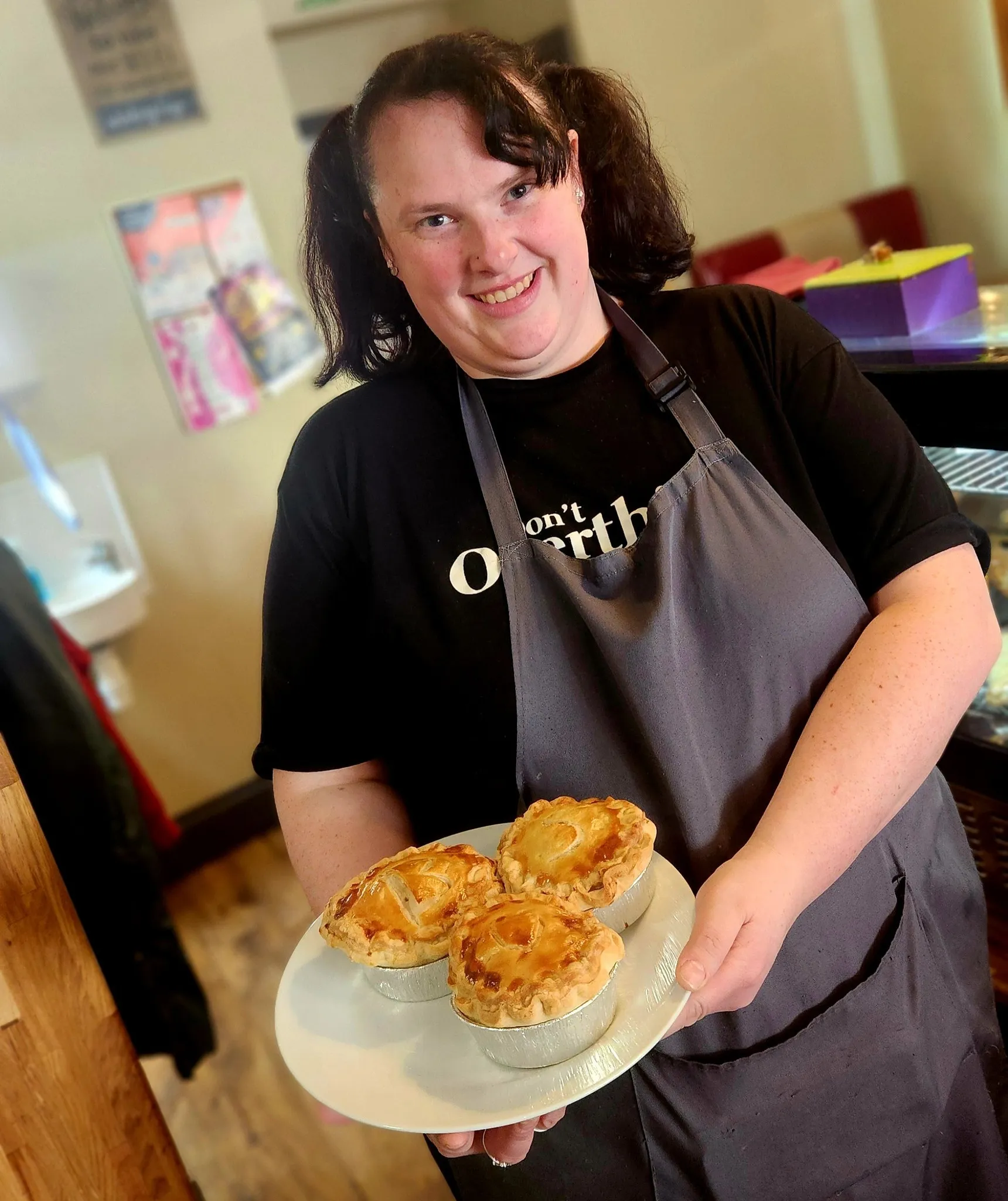 Learner showing thier pies that they made from scratch